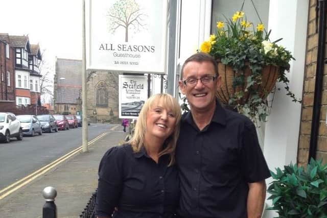 Lesley and Andrew Burr outside the All Seasons Guesthouse.