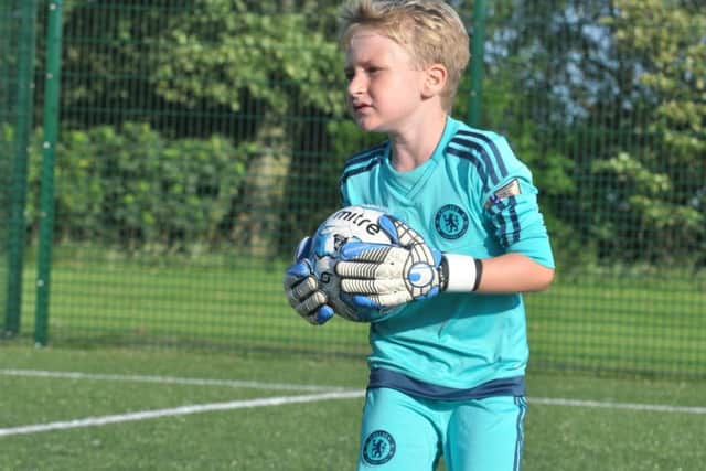 Goalkeeper coaching action