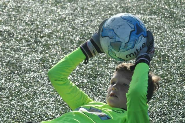 Goalkeeper coaching action
