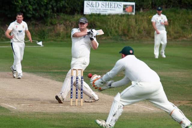 Jamie Nesfield's delivery flies down the leg side during Flixton's home defeat against Selby in Division One. Picture: Steve Lilly.