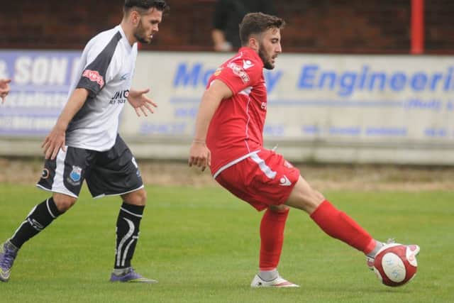Callum Robinson gets on the ball