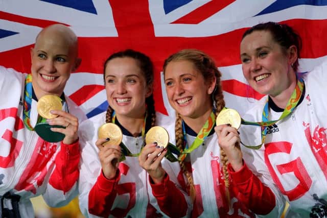 Great Britains Joanna Rowsell Shand, Elinor Barker, Laura Trott and Katie Archibald celebrate following their gold medal in the Womens Team Pursuit at the Rio Olympics.