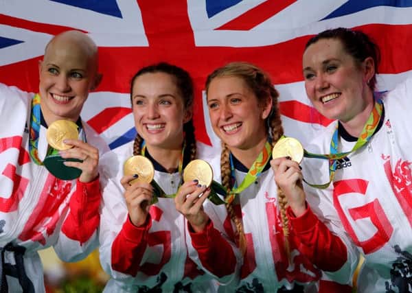 Great Britains Joanna Rowsell Shand, Elinor Barker, Laura Trott and Katie Archibald celebrate following their gold medal in the Womens Team Pursuit at the Rio Olympics.