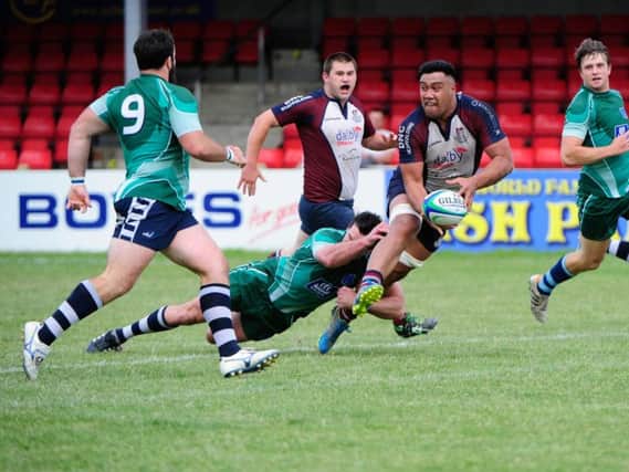 Isaac Faamau in action against Pock. Picture: Andy Standing.