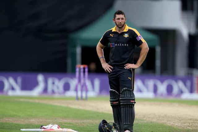 Yorkshire's Tim Bresnan stands dejected after defeat in the Royal London Cup semi-final at Headingley. Picture: Richard Sellers/PA.