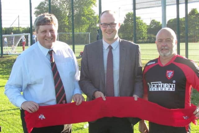 Boro's Andy Troughton with Raflatac's Neil Bland and Boro boss Steve Kittrick