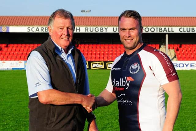 Mike Holder of Scarborough RUFC welcomes Graham Hogg