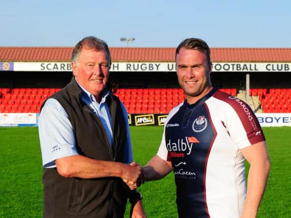 Mike Holder of Scarborough RUFC welcomes Graham Hogg