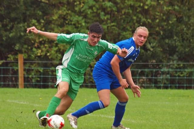 Hunmanby Reserves, blue kit, and Fishburn Park Reserves played out a 2-2 draw in Division Three. Picture: Steve Lilly