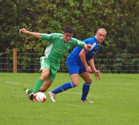 Hunmanby Reserves, blue kit, and Fishburn Park Reserves played out a 2-2 draw in Division Three. Picture: Steve Lilly