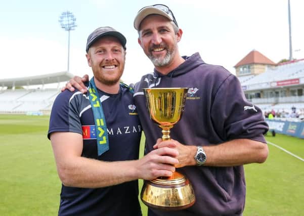 Yorkshire captain Andrew Gale and first team coach Jason Gillespie celebrate with the County Championship trophy in 2014. Picture: Alex Whitehead/SWpix.com