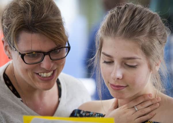 Elanor Wood from Scalby School collect her GCSE results. w1407i. Pic: Scott Wicking.