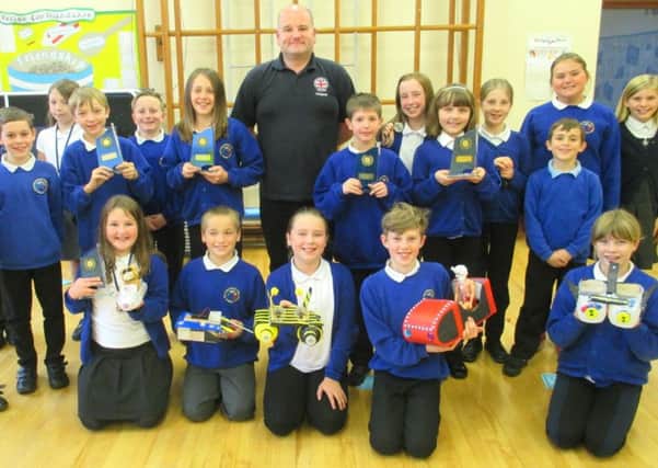 Hertford Vale Primary Schools Year 6 pupils with their Engineering Week awards and power boats.
