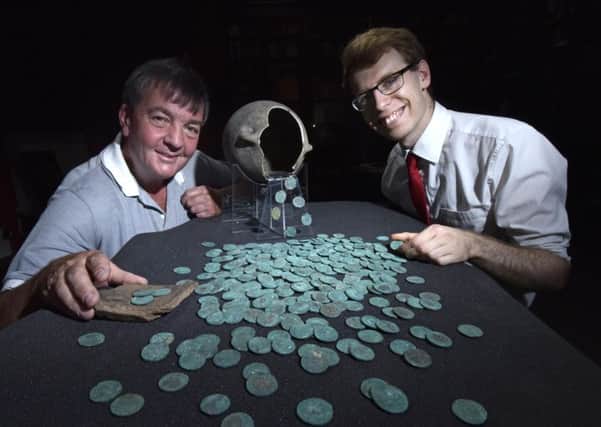 Metal detectorist David Blakey with curator Andrew Woods and the Wold Newton hoard.