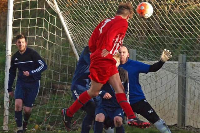 Edgehill Reserves head in one of their 13 goals against Falsgrave. Picture: Steve Lilly
