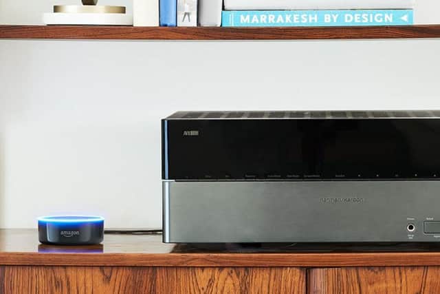 The Amazon Echo Dot sits on a shelf and waits for you to speak to it