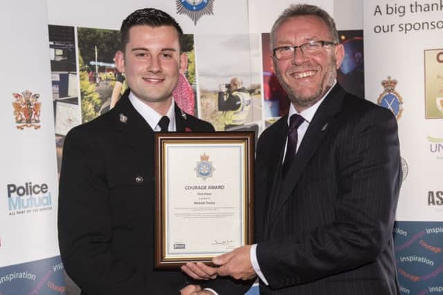 PC Michael Tinsley  presented the gold award by Mike Stubbs