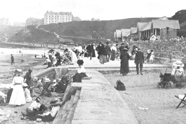 In this picture of Edwardian folk at leisure the extent of Scarborough's North Bay promenade can be seen as the straight edge of concrete paving meets the sand.
The promenade was extended northwards in 1925 as far as the bulge where Peasholm Dale met the shore.
Dominating the skyline in the distance is the Clifton Hotel.
Photo reproduced courtesy of the Max Payne collection.
Reprints can be ordered with proceeds going to local charities. Telephone 0330 1230203 and quote reference number