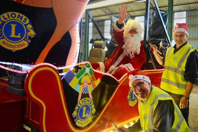 Santa and Ryedale Lions members get the sleigh ready for the Ryedale tour.