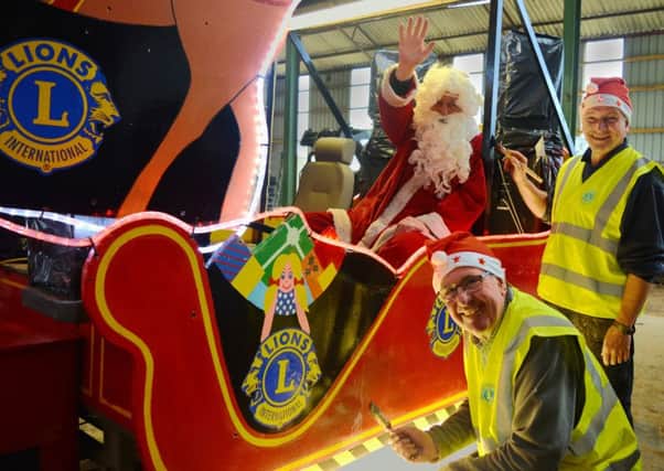 Santa and Ryedale Lions members get the sleigh ready for the Ryedale tour.
