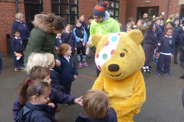 Pudsey Bear meets some of the pupils at Bramcote Junior School