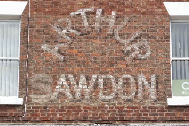 Arthur Sawdon ghost sign above CBK solicitors.