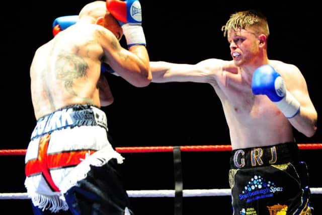 George Rhodes on his way to victory against Peter McGurk