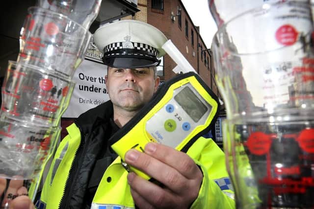 TC Paul Long with a breathalyser .165025a