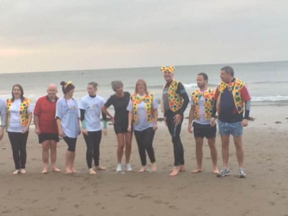 Staff from Lloyds bank in Scarborough prepare for their sponsored swim for Children in Need.