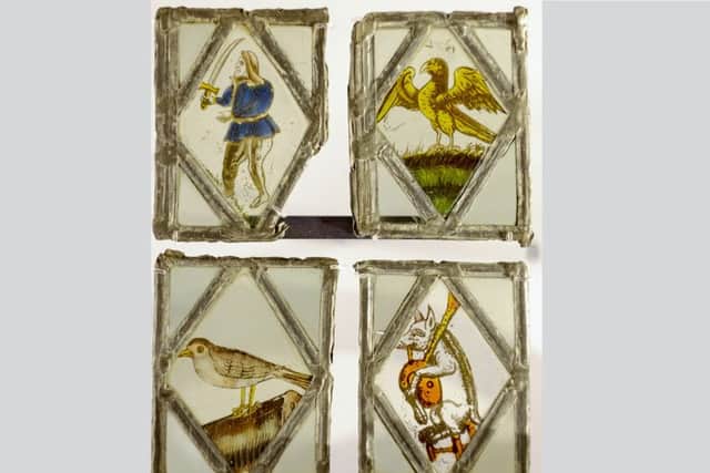 Set of four stained glass windows on display in Scarborough's Rotunda Museum.
