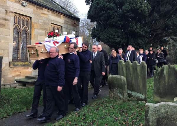 Mourners at the funeral of Willie Wright from Staithes.