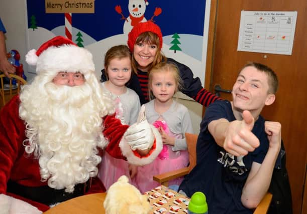 Leeds Bradford Airport / Martin House santa visit.
Photograph by Richard Walker/ www.imagenorth.net