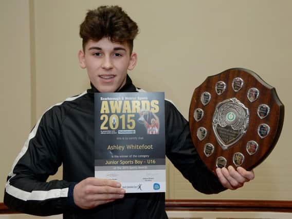 Whitby Boxing Club's Ashley Whitefoot shows off his silverware