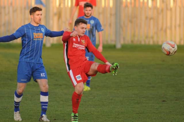 Bridlington Town's Jamie Forrester with a shot on goal v Pickering Town