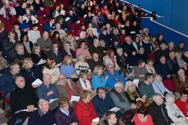 The crowd packs into the YMCA