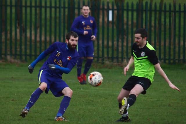 Goalsports get on the ball during their 7-0 win at Rosette. Picture: Steve Lilly