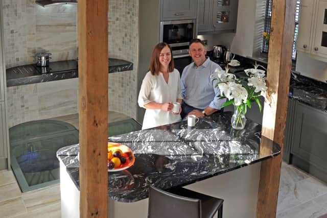 Maxine and Alan in the kitchen of their home, which was fashioned from a Georgian coach house.
