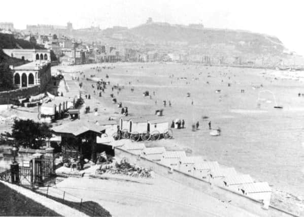 This scene of Scarborough's South Bay is taken from the footpaths close to where the Aquaruim roundabout stands today.
In the foreground is the elaborate gated entrance and ticket booth to the Spa area and on the extreme left bathing machines stand on an undeveloped Foreshore Road.
Construction of Foreshore Road was completed in 1877 to coincide with the inauguration of the Aquarium underground entertainment complex.
Photo reproduced courtesy of the Max Payne collection. 
Reprints can be ordered with proceeds going to local charities. Telephone 0330 1230203 and quote reference number