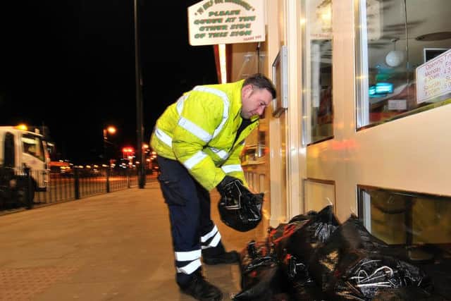 Sandbags going down at Harbour Bar