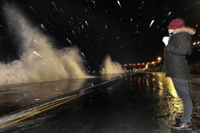 Snow and waves batter North Bay
