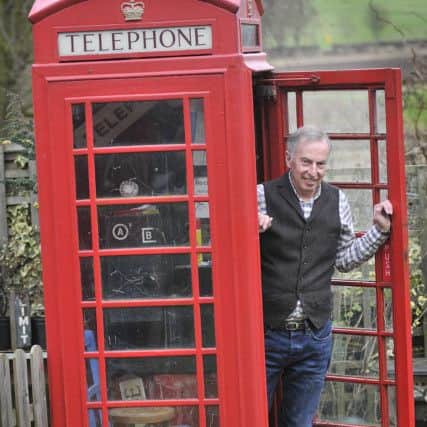 Boynton  water colour  artist  Andrew Storrie paying a visit to his garden phone box. pic Richard Ponter 170218h
