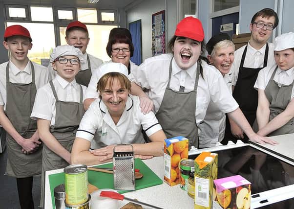 Filey Ebor Academy . Learning healthy food skills .Rachel Brickman with staff and pupils celebrating a healthy learning day.pic Richard Ponter170401d