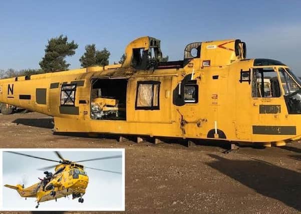 The Sea King helicopter which is being transformed into a cafe. Inset: the Sea King in action as a search and rescue helicopter.