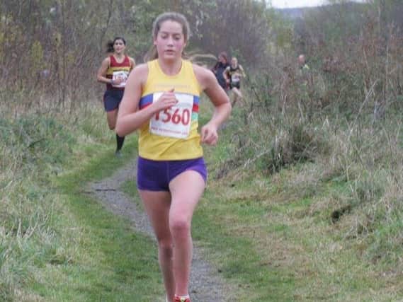 Scarborough AC star Emma Clapton in cross-country action