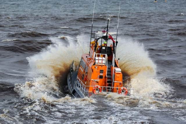 The Whitby lifeboat launches in rough seas. All pictures: Ceri Oakes