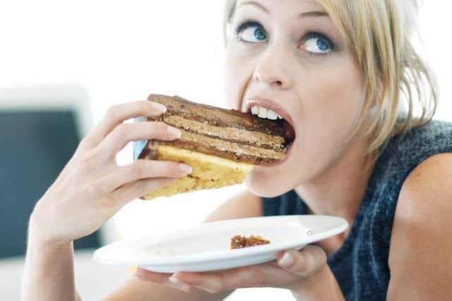 A Treasury offical has advised office workers to cut back on cake and sugar-loaded treats in the office.