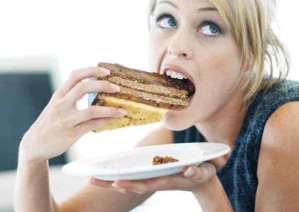 A Treasury offical has advised office workers to cut back on cake and sugar-loaded treats in the office.