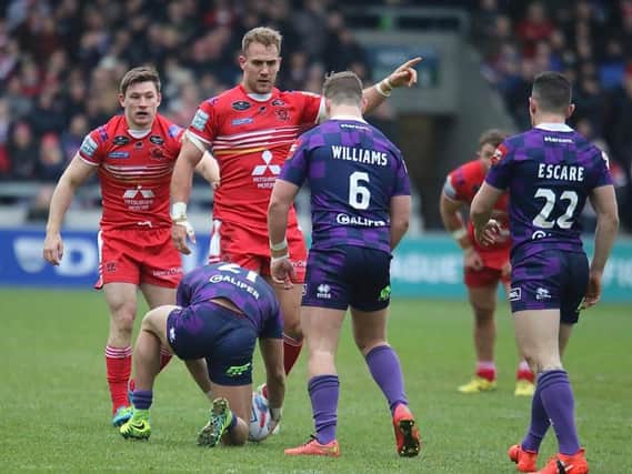 Kriss Brining prepares to get stuck in against Wigan Warriors in his Super League debut. Picture: Salford Red Devils
