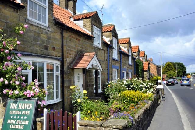Stone cottages on Burniston High Street.