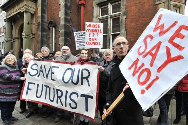 Protesters outside the demolition meeting
